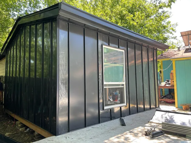 Black standing seam metal wall panels for Roof Inspection in Swanzey