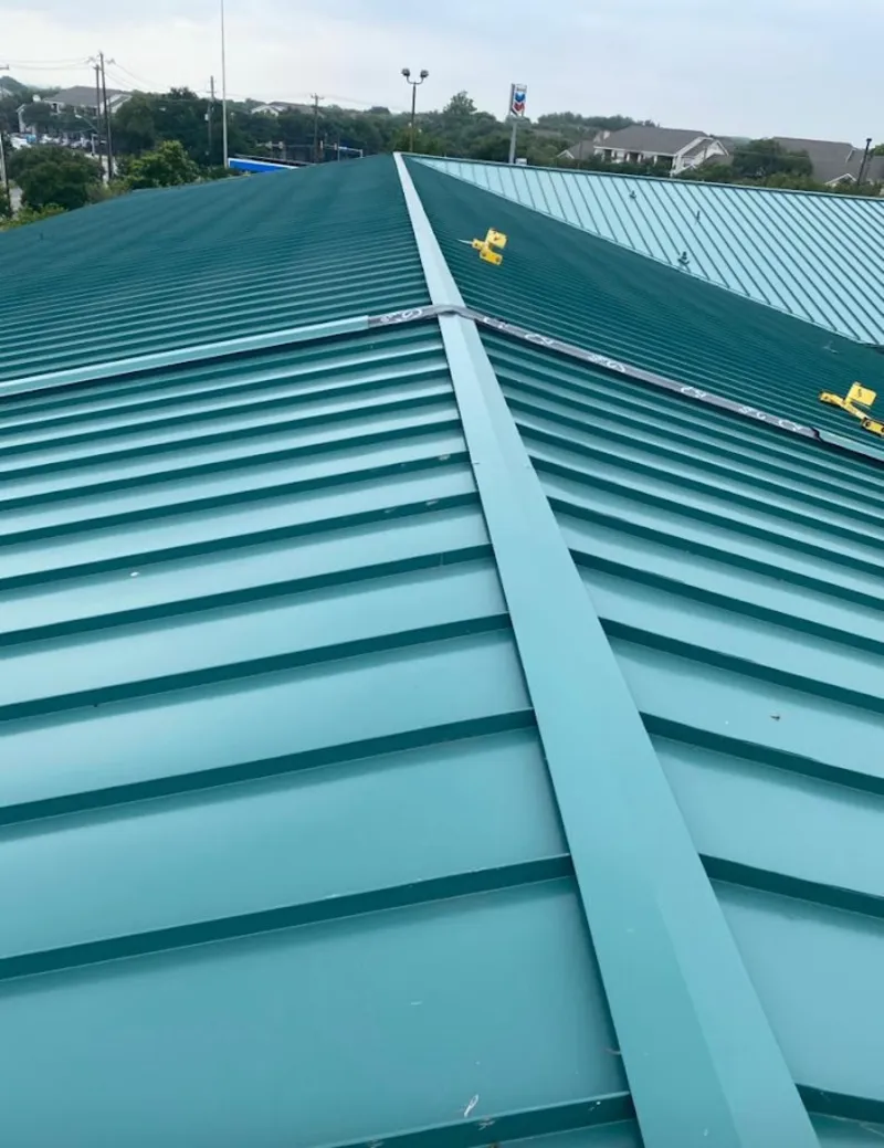 Green commercial metal roof ridge and valley for Metal Roof Repair in Swanzey