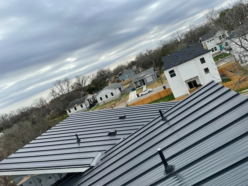 Standing seam metal roof panels with vents for Skylight Repair in Swanzey